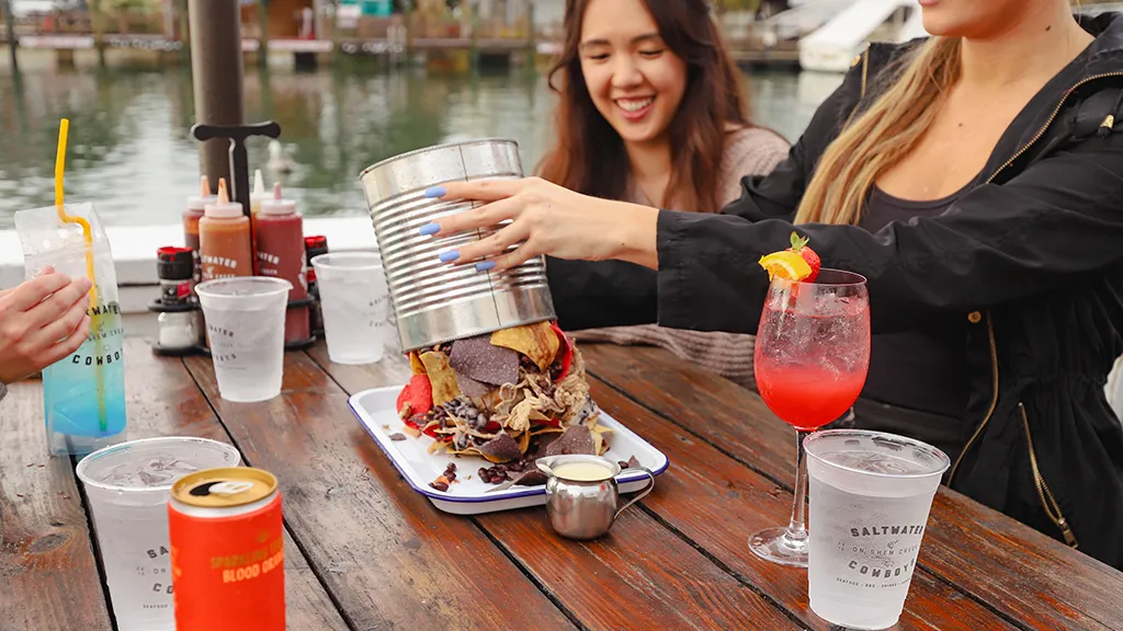 a group of women enjoying seafood